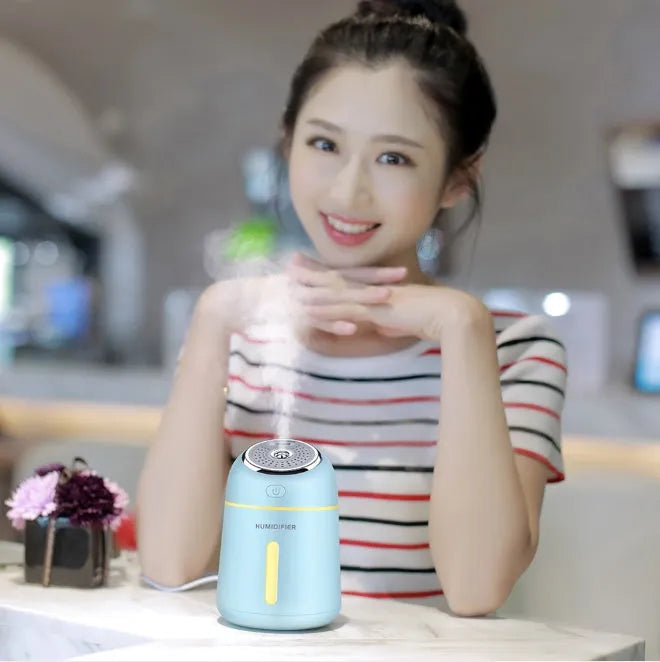 Mini USB ultrasonic humidifier in blue, pink or white, 330ml, 139x96x96mm, with USB fan and LED light