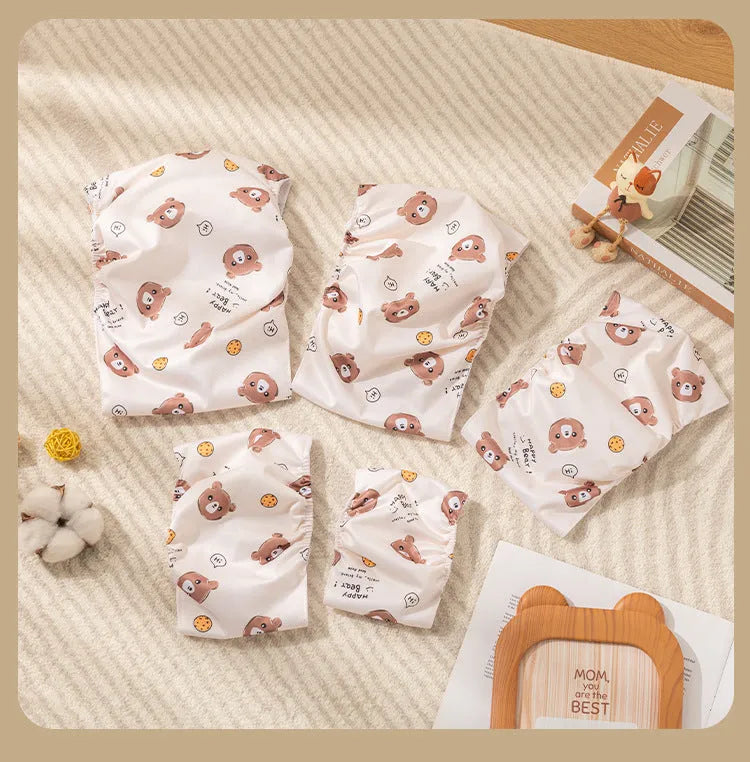 Reusable male dog diaper belly band in cartoon bone paw print pattern with fastener tape