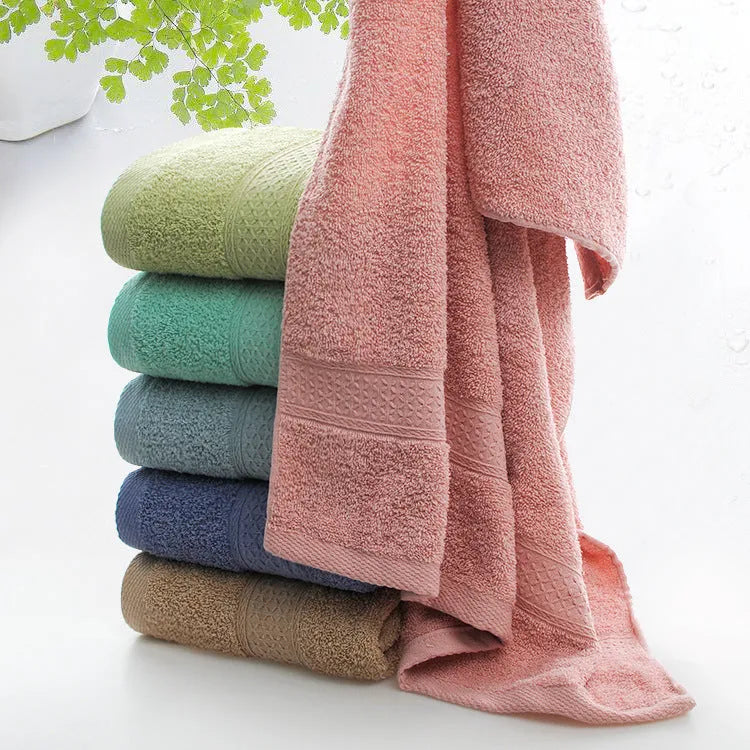 Thickened cotton blend bath and beach towel in apple green, dark blue, dark green, emerald green, light brown, or light pink.