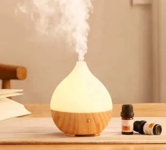 Asakusa wood grain vase-shaped aroma diffuser with USB cable on a wooden surface.