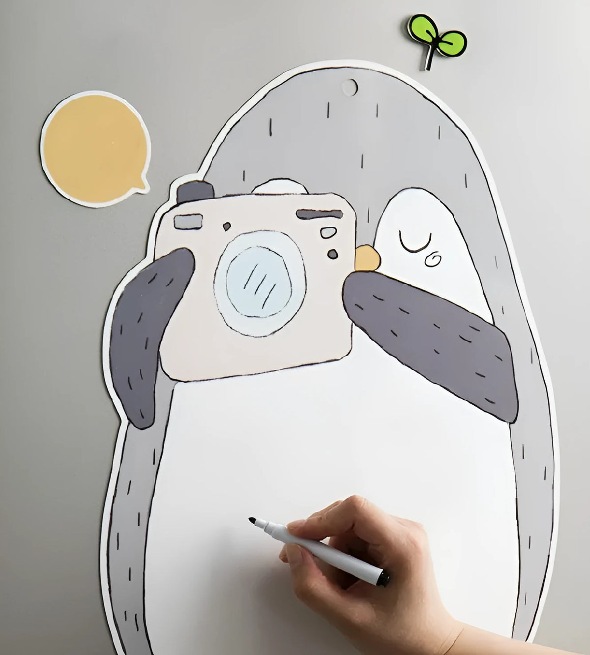 Penguin design refrigerator message board with magnetic backing measuring 45cm by 30cm