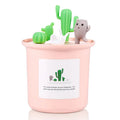 Creative cute pet vase-shaped ultrasonic humidifier in ivory white with USB cable on desk