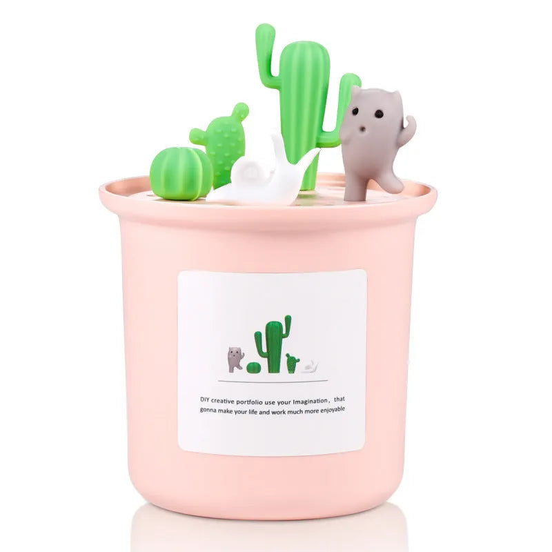 Creative cute pet vase-shaped ultrasonic humidifier in ivory white with USB cable on desk