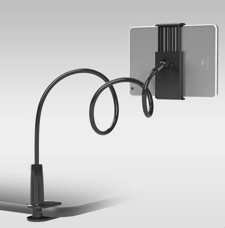 Black aluminium alloy and plastic bedside phone handset with long arm extended on a wooden table.