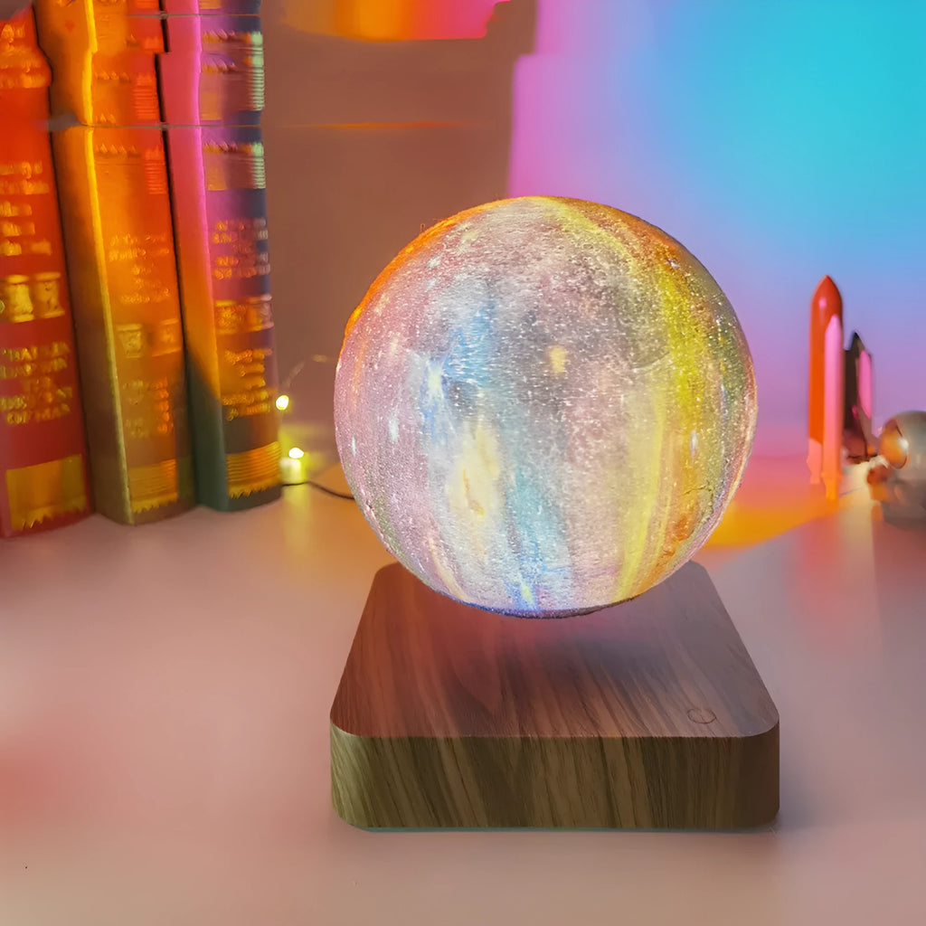 Magnetic levitation galaxy decorative light with floating moon lamp rotating above walnut-coloured base