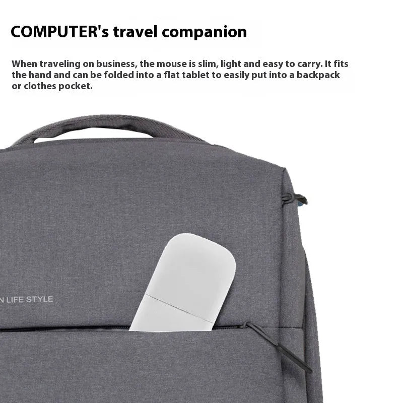 Folded Bluetooth wireless mouse showing compact size with touch surface and multiple colour options