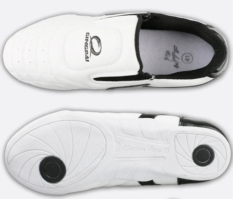 Black and white children's martial arts shoes with soft bottom and widened sole design