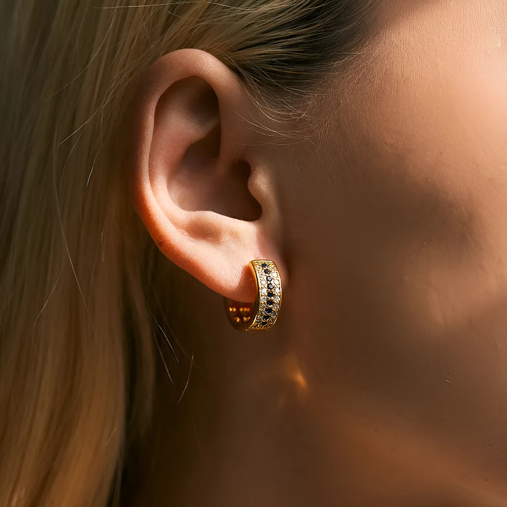 Round geometric women's earrings with 18K gold electroplated finish on copper base metal