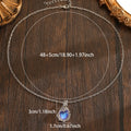 Moonstone necklace with oval cabochon pendant and silver-tone chain for weddings and everyday wear