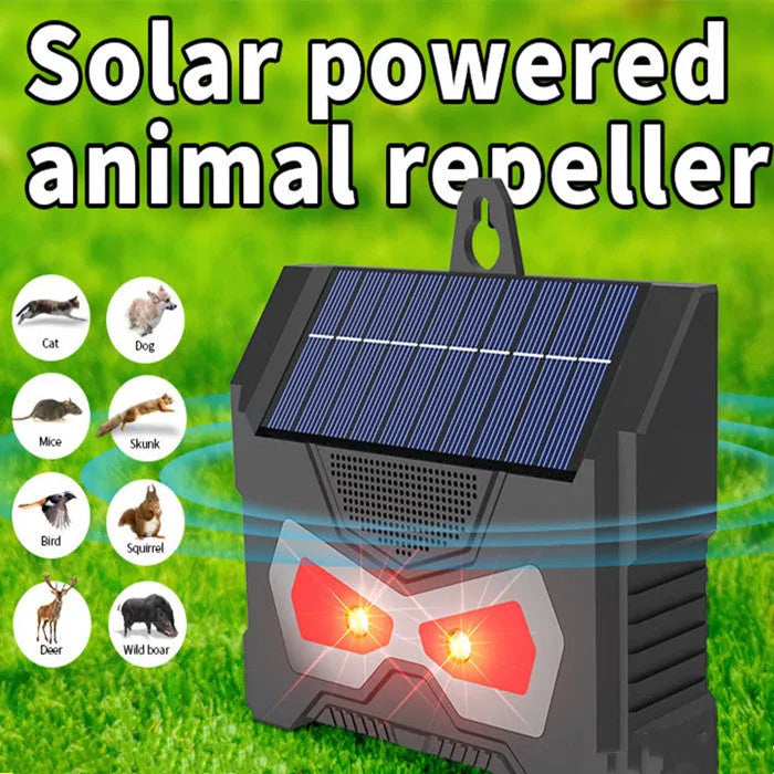 Black solar-powered ultrasonic outdoor animal repeller device with charging cable.