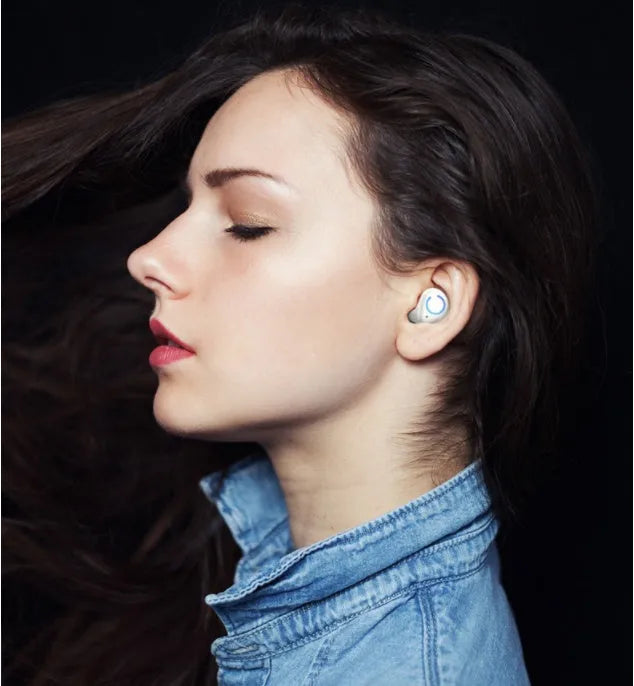 M18 true wireless in-ear headset in black or white colour with compact charging case.