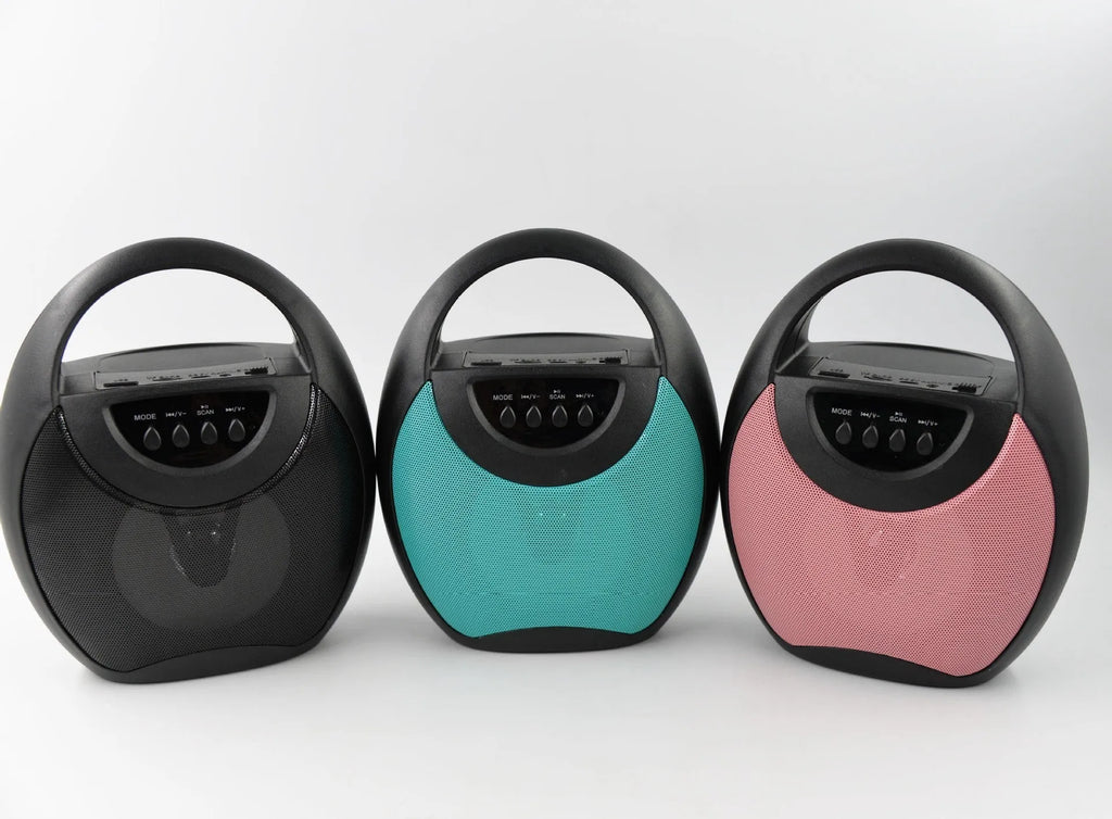 Portable Bluetooth speaker in black, blue or pink with USB port for charging