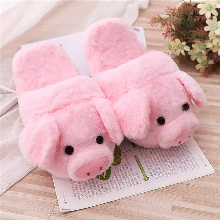 Pink pig-shaped floor slippers made from short plush fabric.