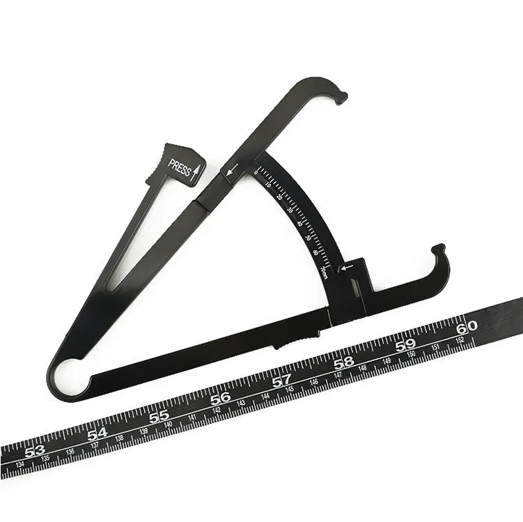 Black ABS plastic body fat caliper with measurement scale and included flexible measuring tape.