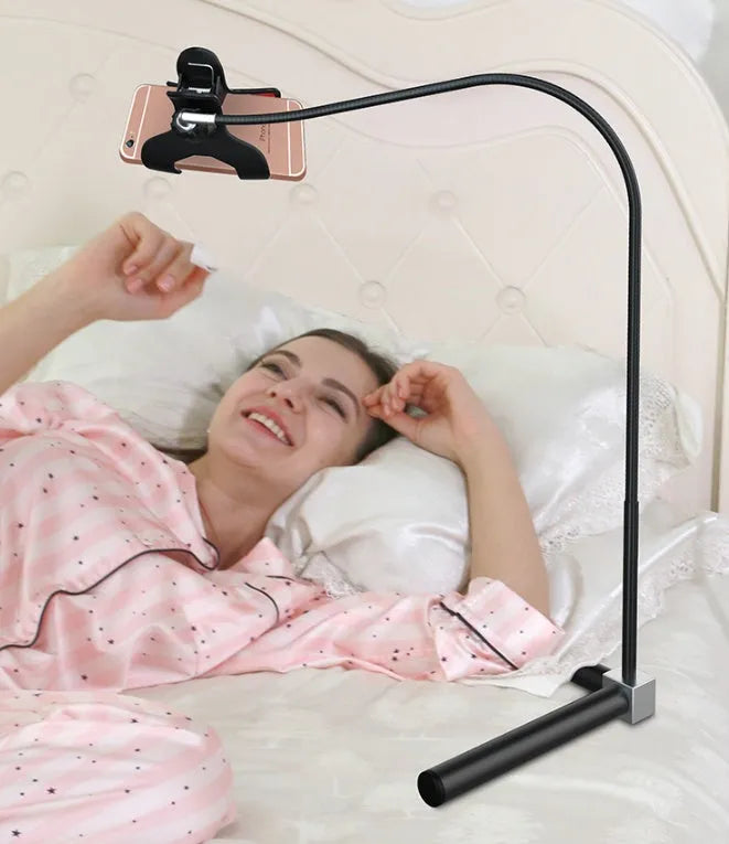 Adjustable bedside mobile phone holder bracket in black or white with universal clamp and folding mount