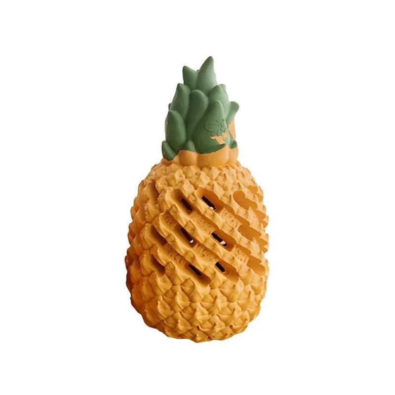 Yellow pineapple-shaped rubber dog chew toy with hollow treat section for small and large dogs