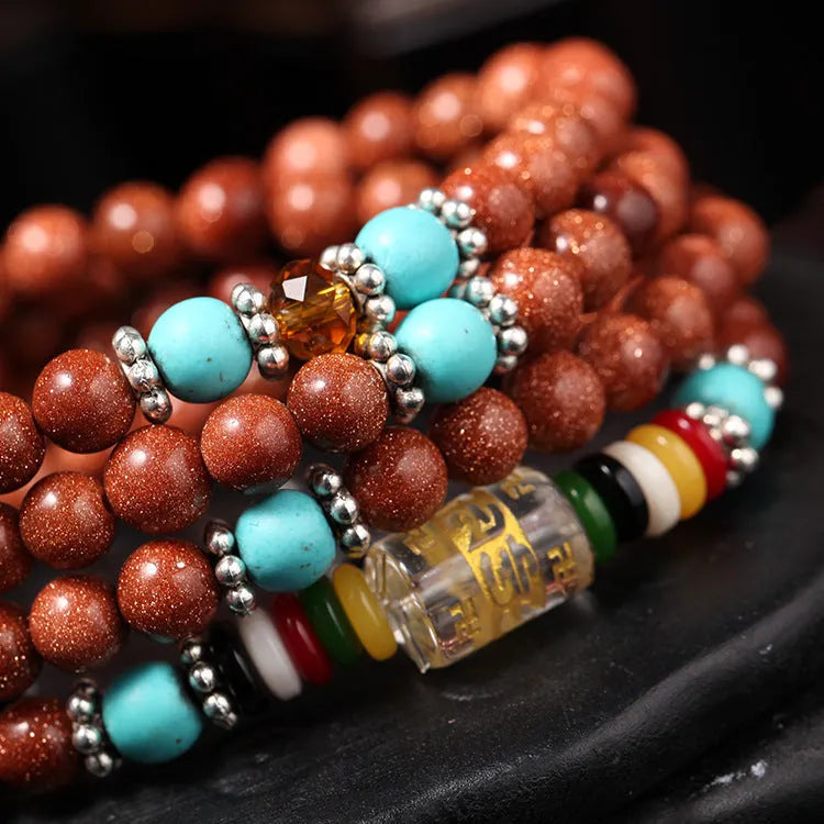 Golden star stone Six Words Mantra bracelet with 108 nugget sand beads and fu character charms
