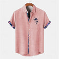 Women's loose-fit linen short sleeve shirt with a blue ocean fish pattern embroidered on the lapel.