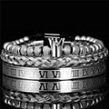 Adjustable crown charm bracelet in stainless steel with zircon detail, available in gold, silver, and black finishes.