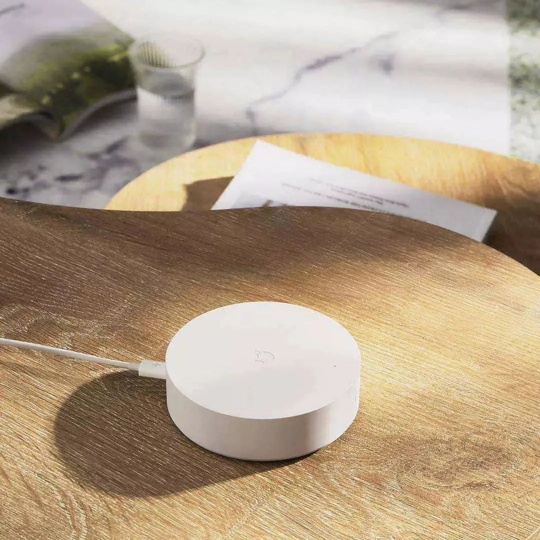 White circular Xiaomijia smart home gateway with UK plug for wireless wall switch control