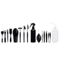Succulent gardening tools set with mini shovel, tweezers, scissors, watering bottle, and cushion on a table.