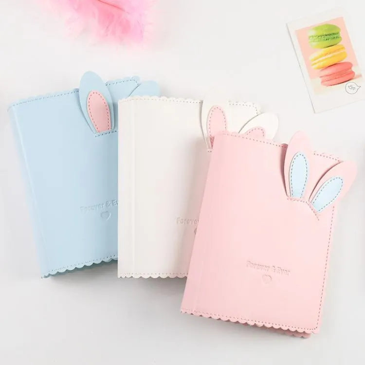 Mini rabbit style photo album in blue, pink, or white with 16 loose-leaf pages