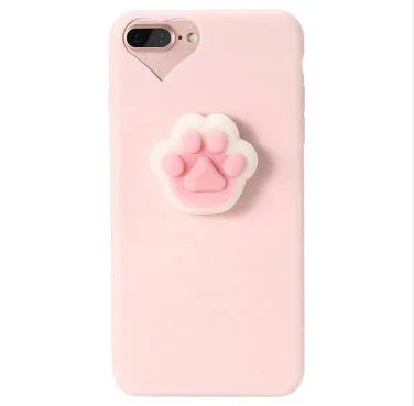 Soft pink silicone TPU phone case with a raised 3D cartoon cat design on the back, fitted to an iPhone.