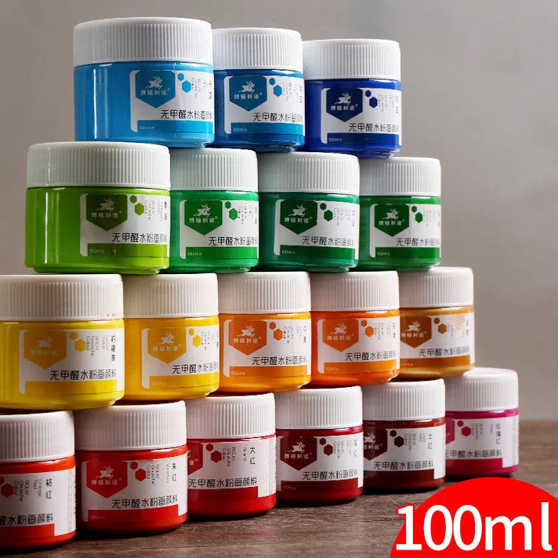 Bottled gouache paint in colours black, blue, orange, purple, red, sky blue and yellow.