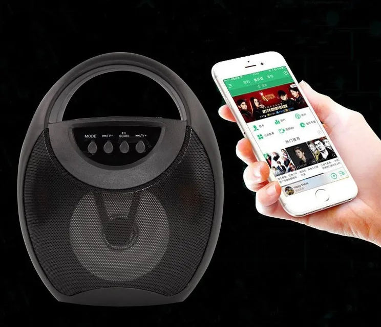 Portable Bluetooth speaker in black, blue or pink with USB port for charging