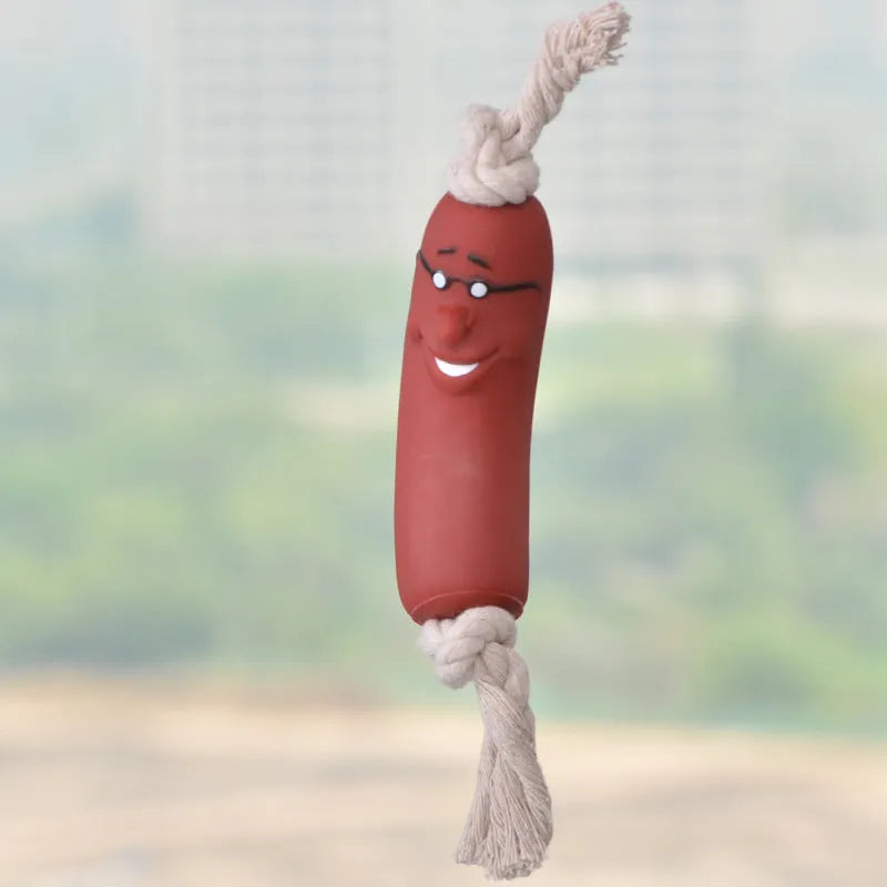 Red silicone sausage gnaws pet toy with dental cleaning knots