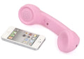 Retro phone style Bluetooth wireless headset in multiple colour options on a table.