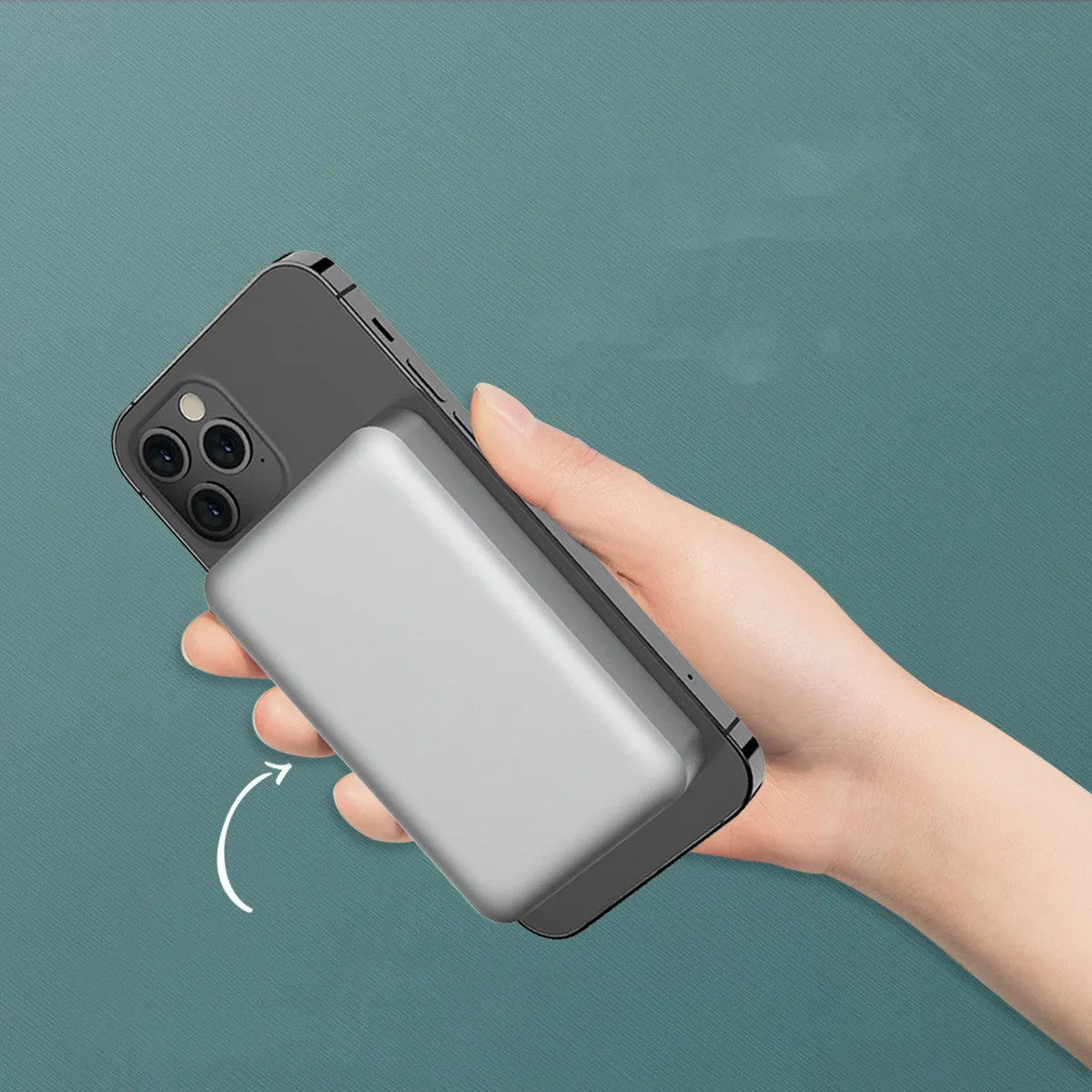 Silver aluminium Apple wireless magnetic power bank showing charging indicator