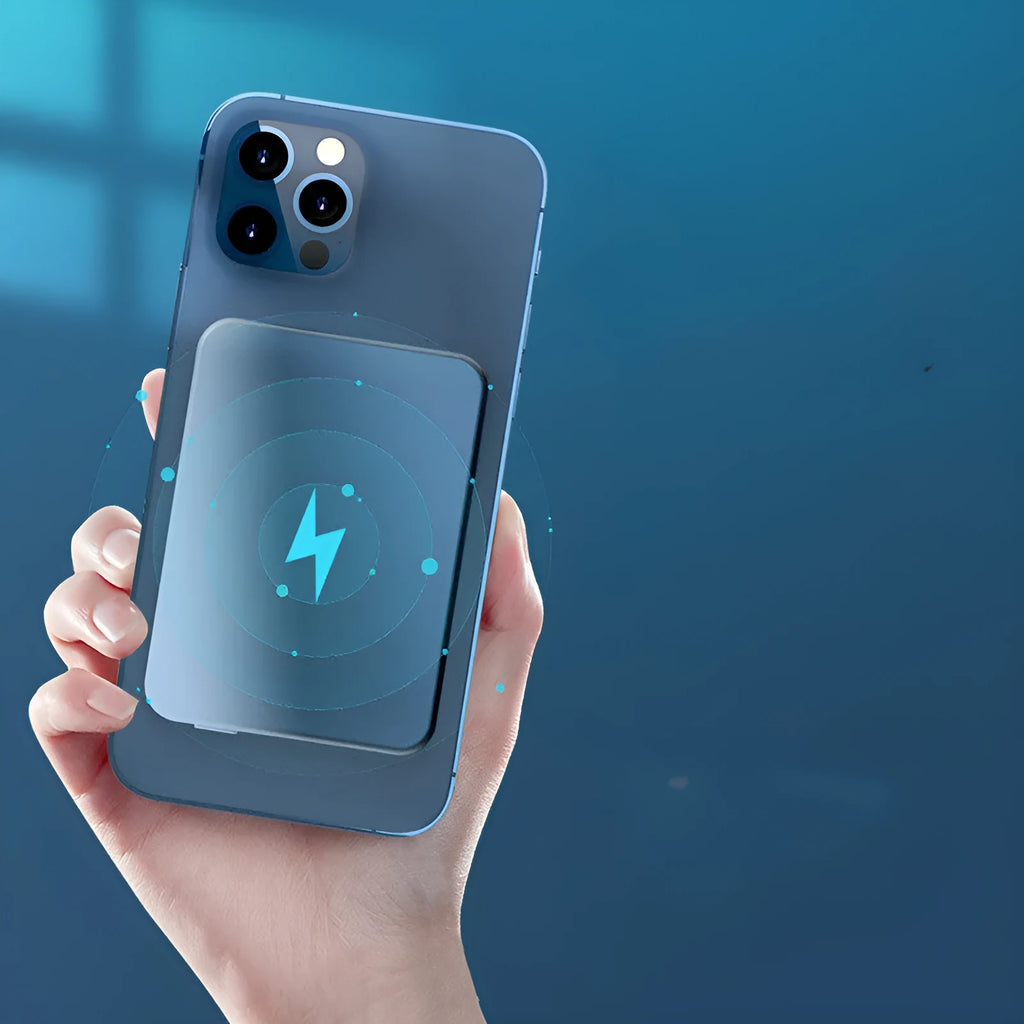 Silver aluminium Apple wireless magnetic power bank showing charging indicator