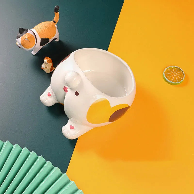 Ceramic pet bowl for cats and small dogs with inclined mouth and high foot, in cartoon cat styles