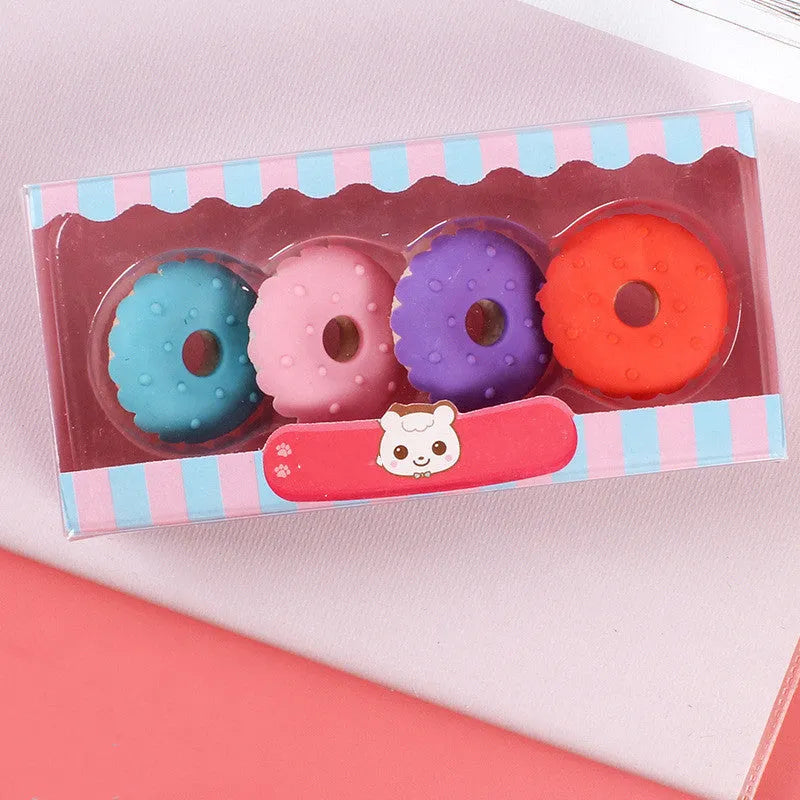 Cartoon eraser gift set with 12 themed pieces featuring cone, ice cream, donut and lollipop designs