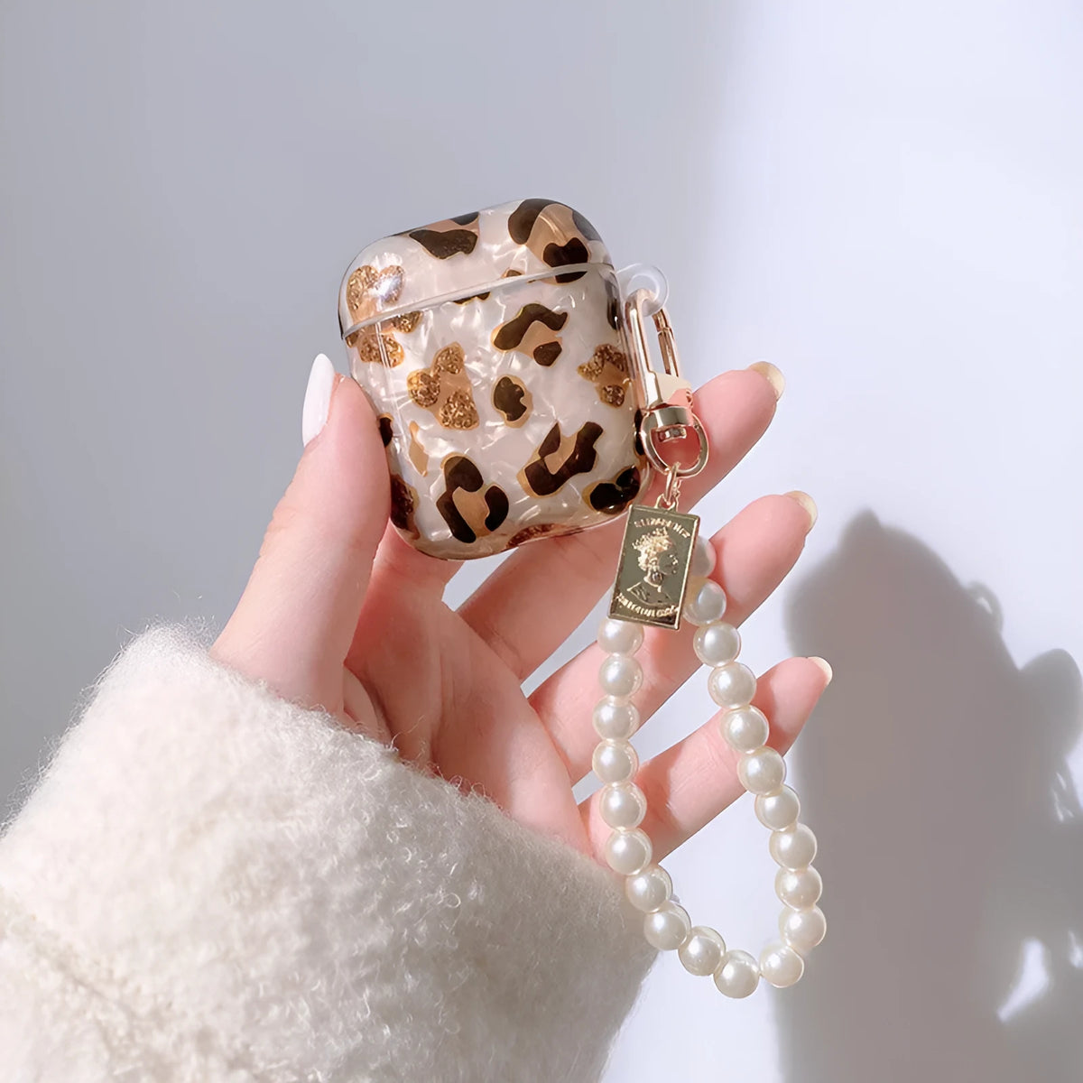 Shell yellow leopard print soft TPU flip case for Apple AirPods Pro on a table.