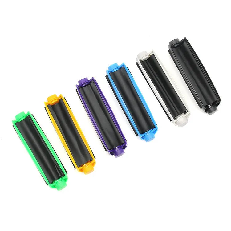 Manual plastic cone cigarette maker in assorted colours on a white background.