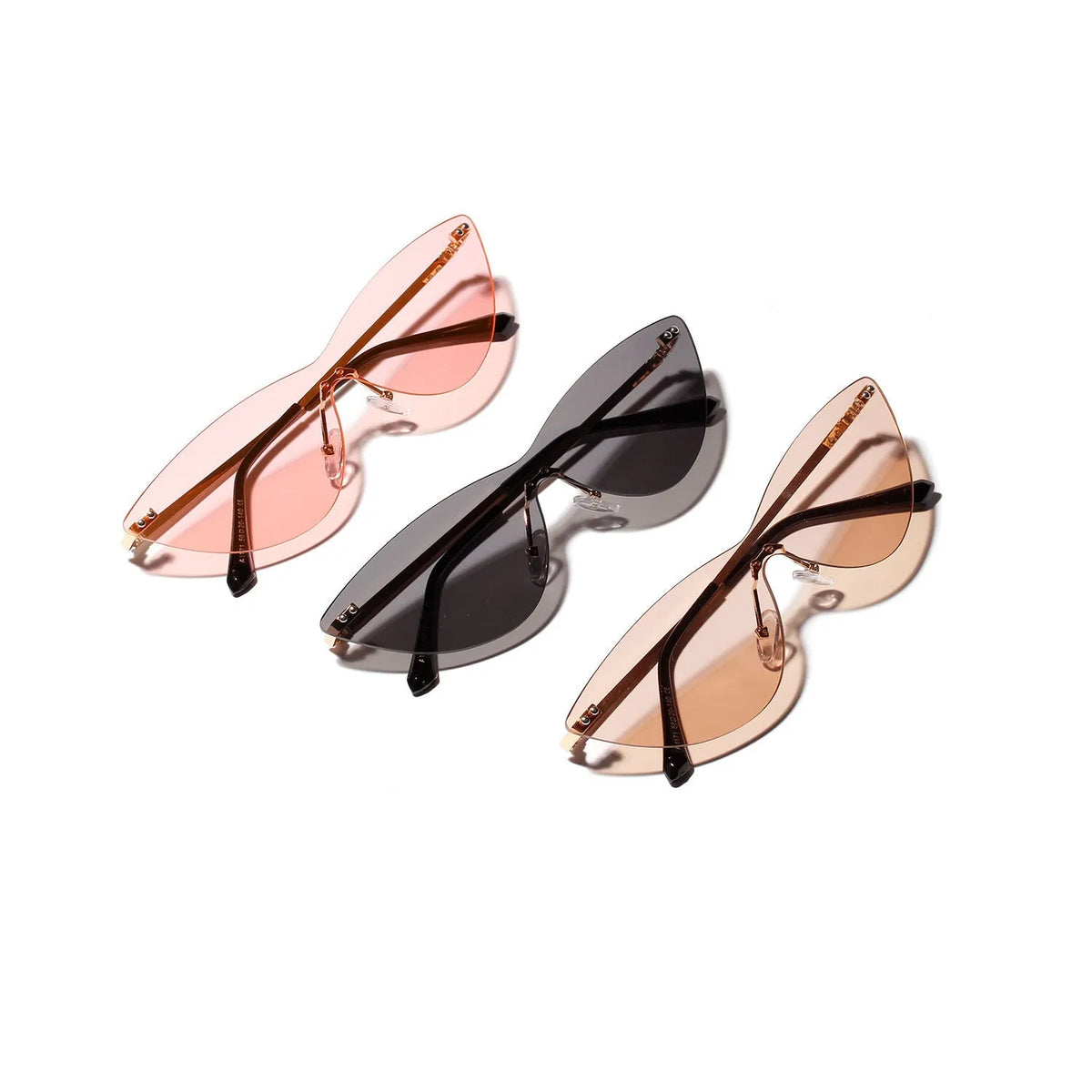 Brown metal frame vintage sunglasses for adults on a plain background