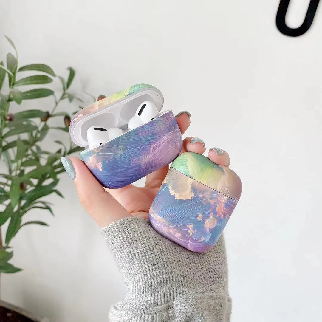 Plastic hard shell protective sleeve for AirPods Pro with watercolour pattern in pink or blue