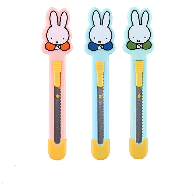 Cartoon-styled art knife with plastic and metal construction for manual production tasks