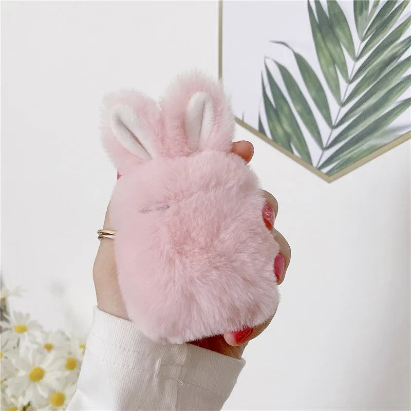 Pink and grey AirPods protective covers with rabbit ears design for Apple wireless headphones