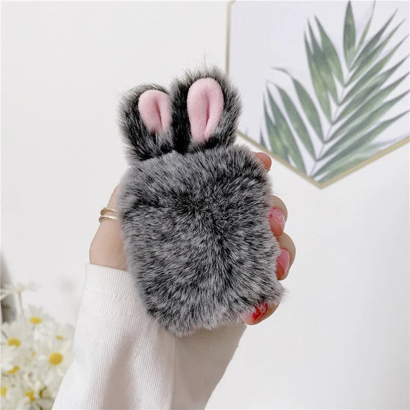 Pink and grey AirPods protective covers with rabbit ears design for Apple wireless headphones