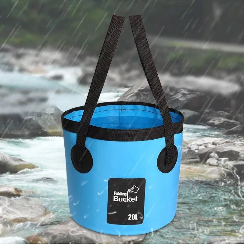 Portable folding bucket in yellow made from PVC tarpaulin, opened to 10.5 inches high with a 20L capacity