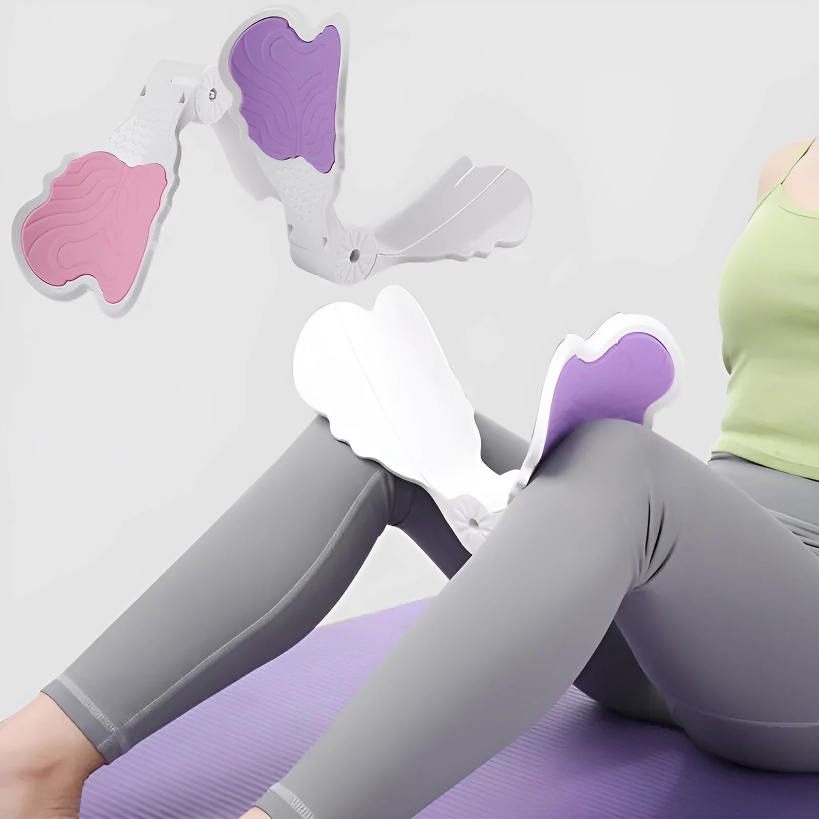 Pink ABS silicone pelvic floor hip trainer 27cm on white background with exercise pose diagram