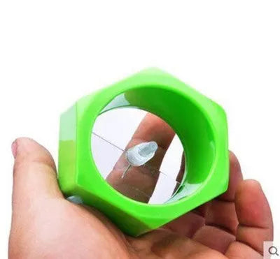 Yellow and green manual spiral vegetable cutter for slicing cucumbers, made from food-grade ABS plastic.