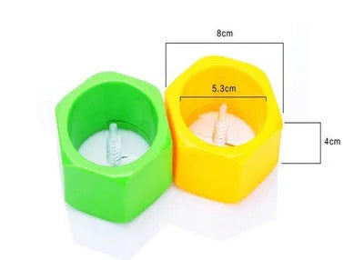 Yellow and green manual spiral vegetable cutter for slicing cucumbers, made from food-grade ABS plastic.