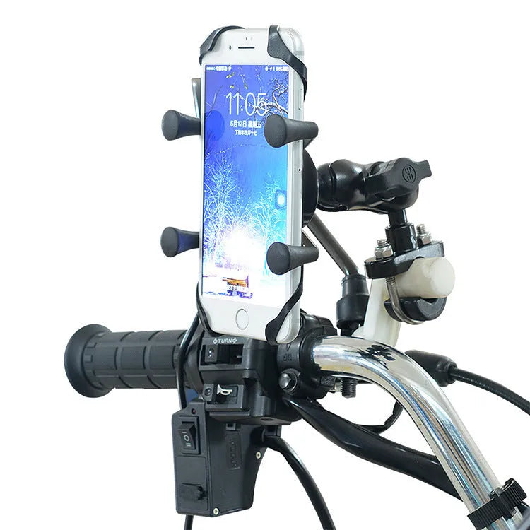 Black aluminium alloy motorcycle phone mount attached to a bike handlebar, holding a mobile phone.