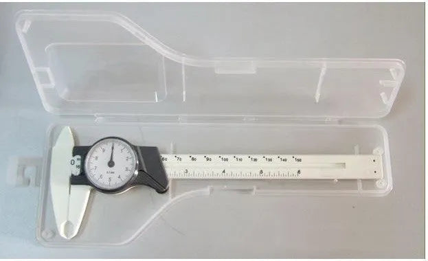 Black and white plastic vernier caliper showing 0-150mm scale with stainless steel measuring jaws