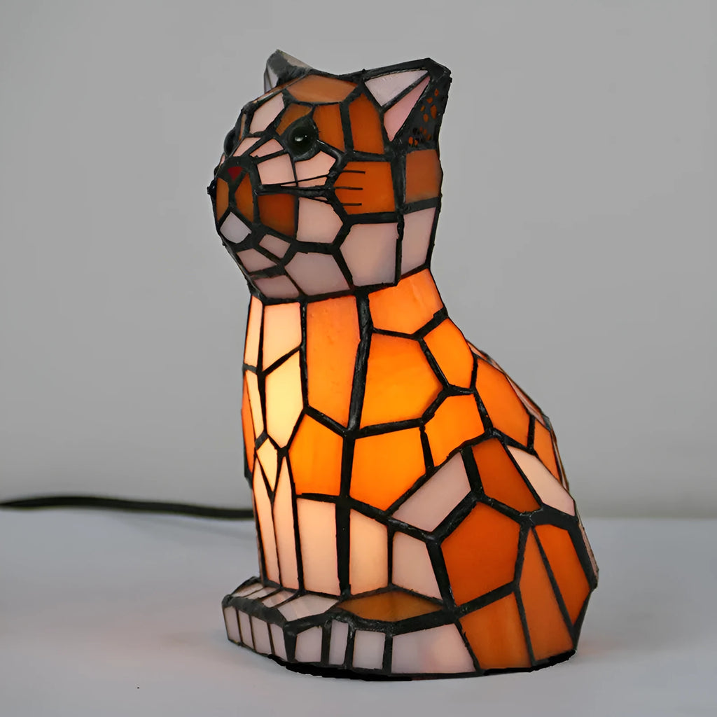 Animal-themed table lamp with Tiffany stained glass shade, 12.5cm wide and 17.8cm high, E12/E14 holder and 5W bulb