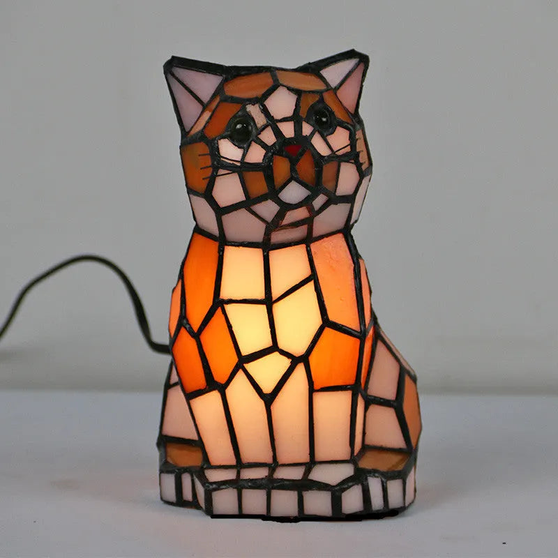 Animal-themed table lamp with Tiffany stained glass shade, 12.5cm wide and 17.8cm high, E12/E14 holder and 5W bulb